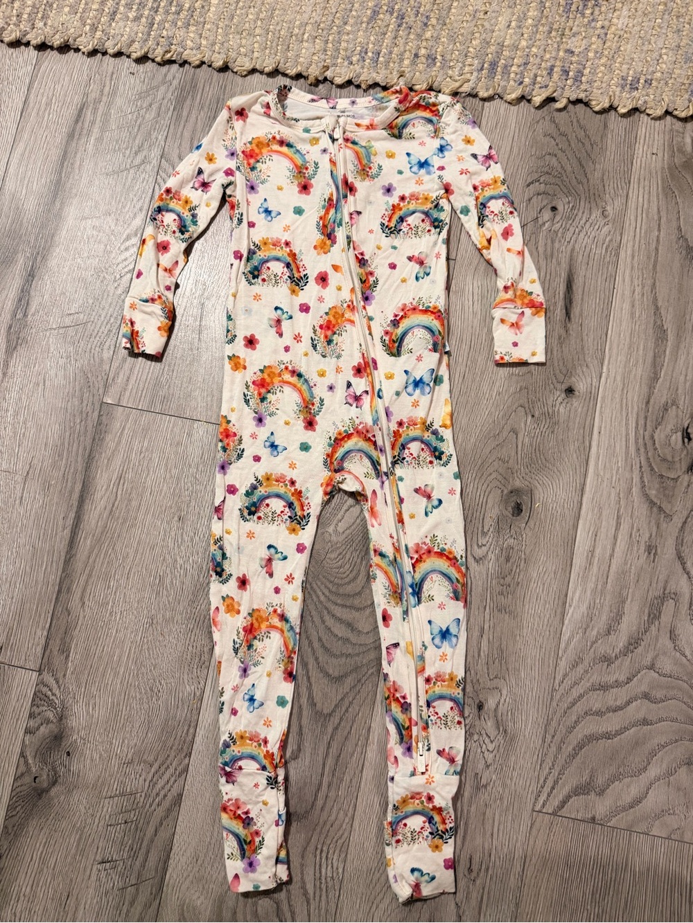 Posh Peanut White One-Piece Footie with Rainbow & Butterfly Print
